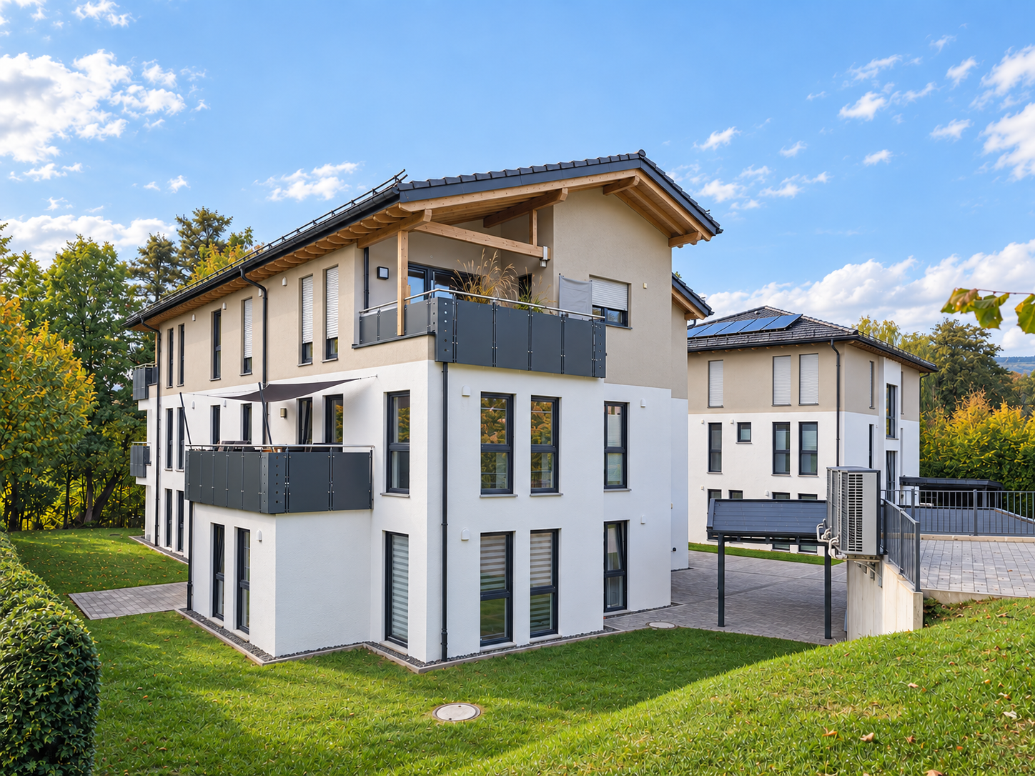 Gartenansicht des Wohnensembles Wohnen am Fluss